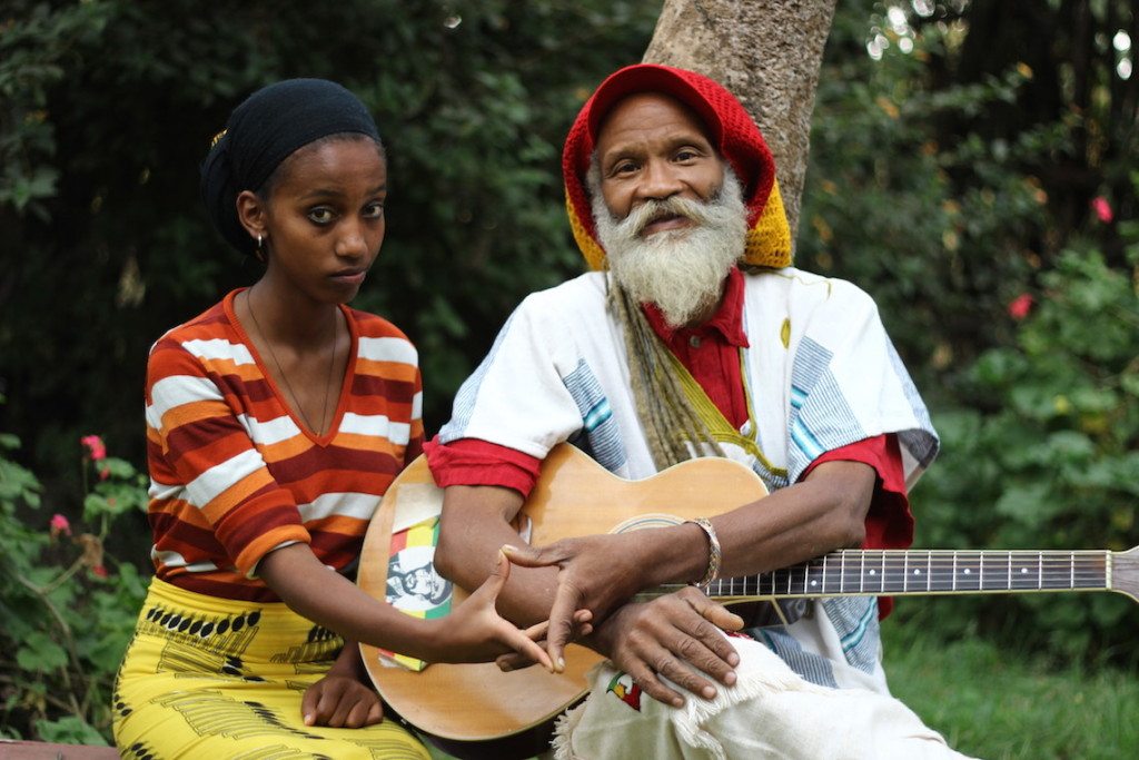 Ras Kawintseb and his daughter playing music in their garden © Sarine Arslanian